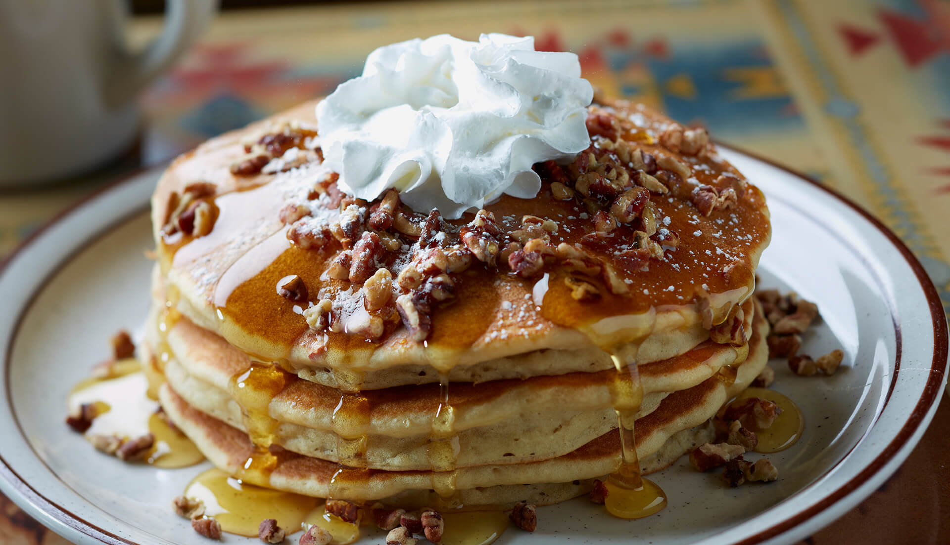 Pancakes with syrup and berries